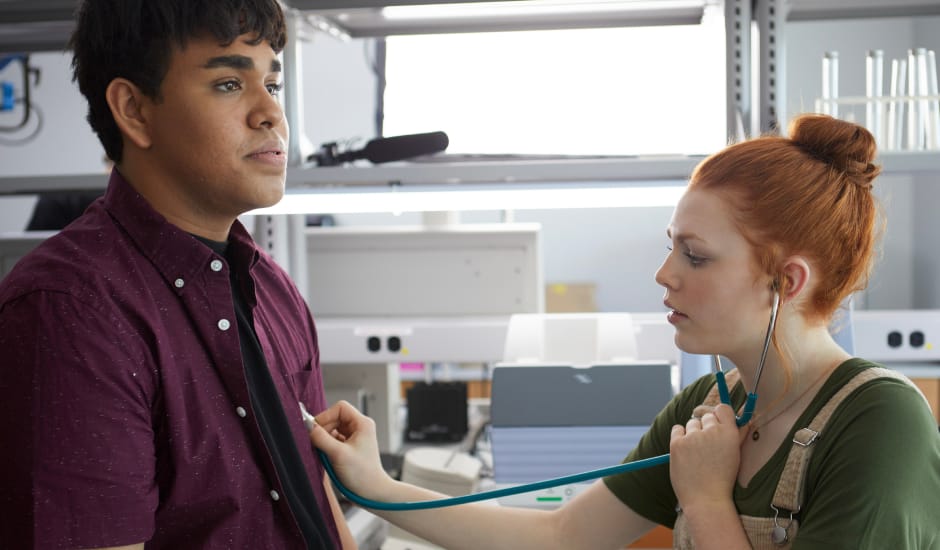 Student hearing her teammate heart